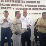 Familias de la delegación Epigmenio González reciben escrituras - Códice Informativo