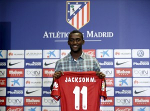 Atletico Madrid's newly signed Colombian striker Jackson Martinez poses with his jersey during a media presentation at the Vicente Calderon stadium in Madrid, Spain, July 26, 2015. REUTERS/Susana Vera