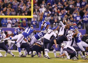 New England Patriots' Stephen Gostkowski (3) kicks the game winning field goal during the second half of an NFL football game against the New York Giants, Sunday, Nov. 15, 2015, in East Rutherford, N.J. The Patriots won 27-26. (AP Photo/Gary Hershorn)